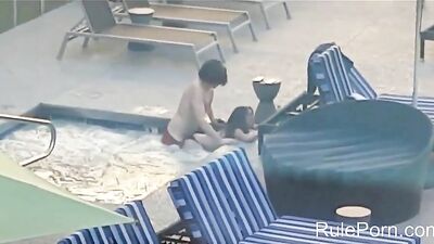 Amateur couple caught fucking in hotel pool