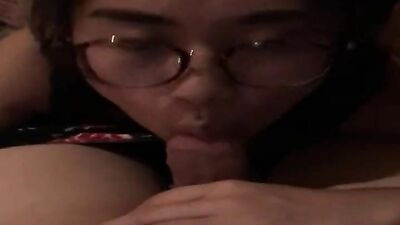 Asian nerd enjoys sucking dick