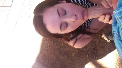 Blowing a fat cock with a facial outdoors 