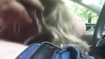 Cute blonde teen sucking cock in the car