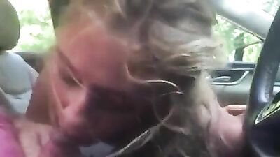 Cute blonde teen sucking cock in the car