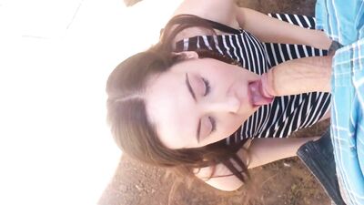 Naughty brunette sucking cock outdoor 