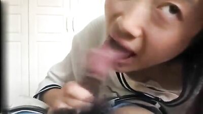 Asian teen sucking hairy cock