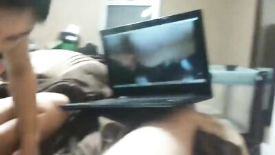 Girlfriend sucks and swallows while he watches porn