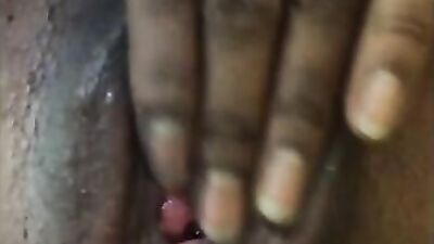 Black MILF fingering closeup 