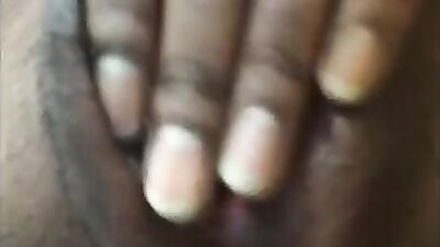 Black MILF fingering closeup 