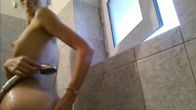 Cute brunette teen in shower