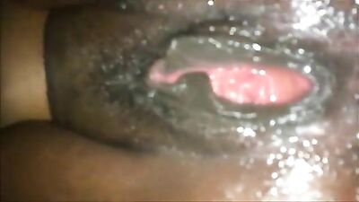 Black squirting pussy releases a river of pussy juice