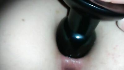 Squirting cum out of my ass while using a butt plug