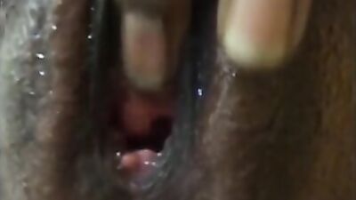 Closeup of black squirting pussy