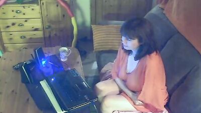 Slutty huge titty mature lady masturbates on the webcam