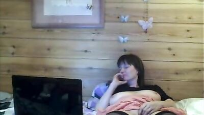 Sweet milf in stockings masturbates hard