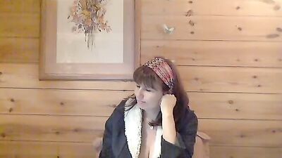 Mature lady showing tits on the webcam