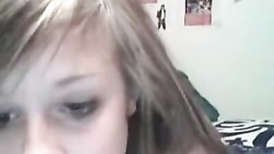 Cute teen girl showing her yummy tits on cam