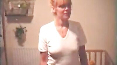 Kinky blonde cougar stripteasing solo