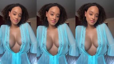 Seductive black babe showing her awesome tits
