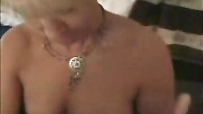Sexy busty milf gets naked