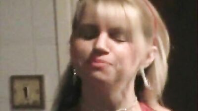 Lynda in hot red dress teasing the camerman with her boobs