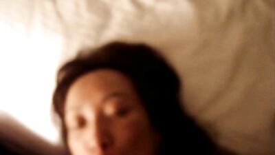 Brunette babe rides cock on a mattress