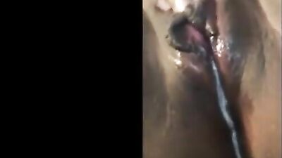 Black slut reaches an intense squirting orgasm