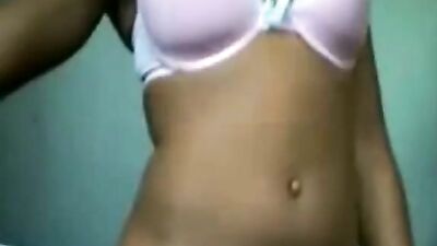 Woman fondles her breasts and fucks herself with a toy