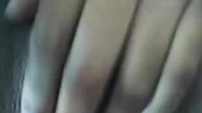 Woman fondles her breasts and fucks herself with a toy