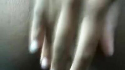 Woman fondles her breasts and fucks herself with a toy