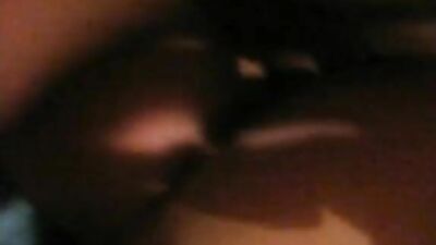 Wrapped cock gets sucked deeply while on the bed