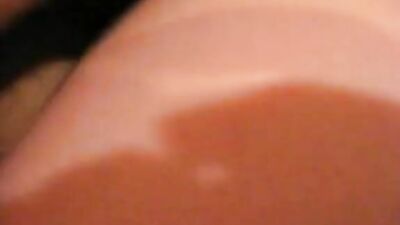 Wrapped cock gets sucked deeply while on the bed