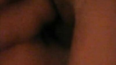 Wrapped cock gets sucked deeply while on the bed