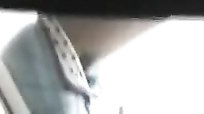 Busty babe's ass in lace panties reflected in the mirror