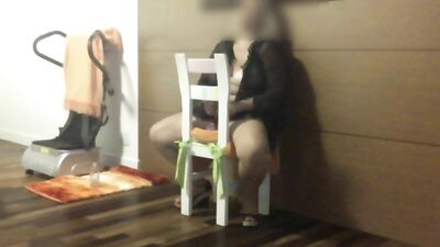 Milf fucks herself with a dildo while watching porn