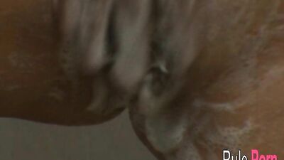 Barbara masturbates her pussy in the shower