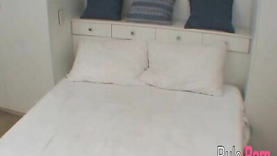 Bruna rides her fingers to a wet pussy orgasm