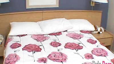 Judy masturbates and spreads her pussy on the bed