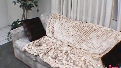 Nicole Parks fucks herself with a dildo on the couch