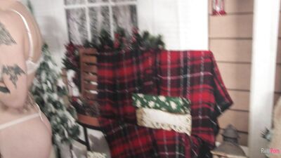 Scarlett gets fucked by a big dildo on Christmas