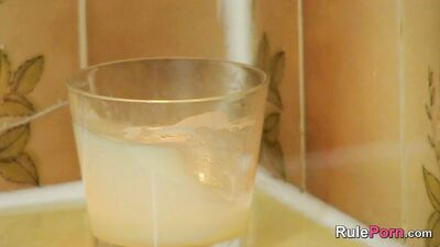 Glass Sex Toy in a Bathtub