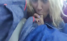 Giving a blowjob in car