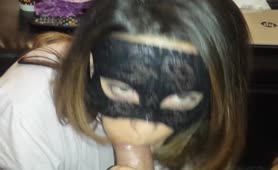 Masked wife gives a blowjob