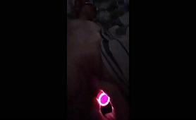 Wife enjoying herself during bedtime with dildo