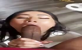Asian girlfriend sucking massive black dong 