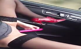 MILF squirting in the moving car 